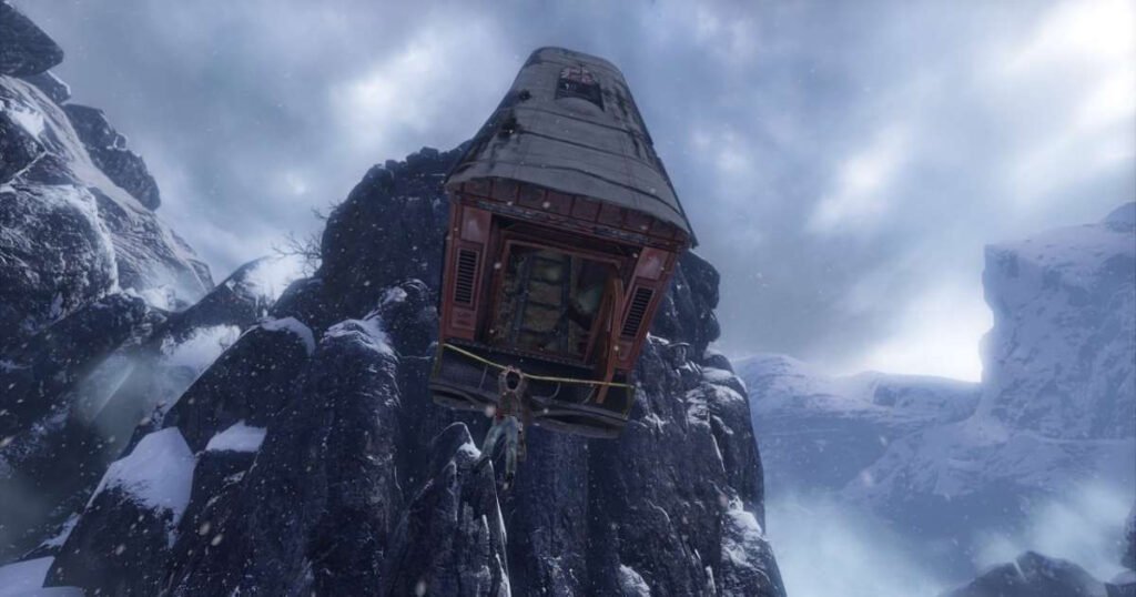 Nathan Drake hanging from a train in the Himalayas during Uncharted 2